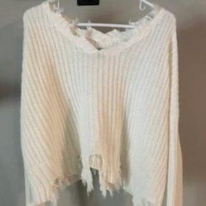 Distressed cropped sweater